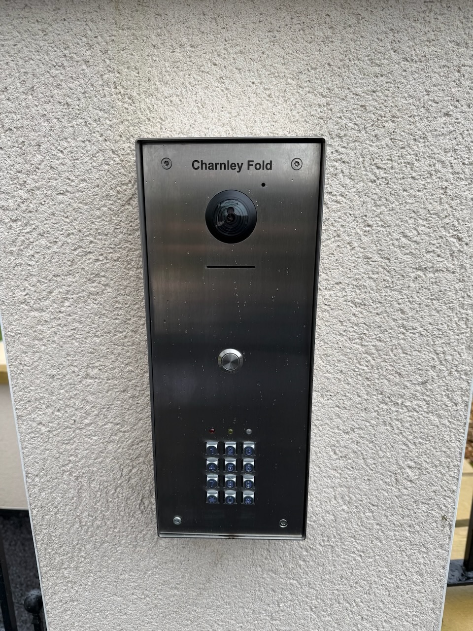 Hikvision video intercom and keypad panel on gate pillar, installed by Wilsons Systems, Lytham