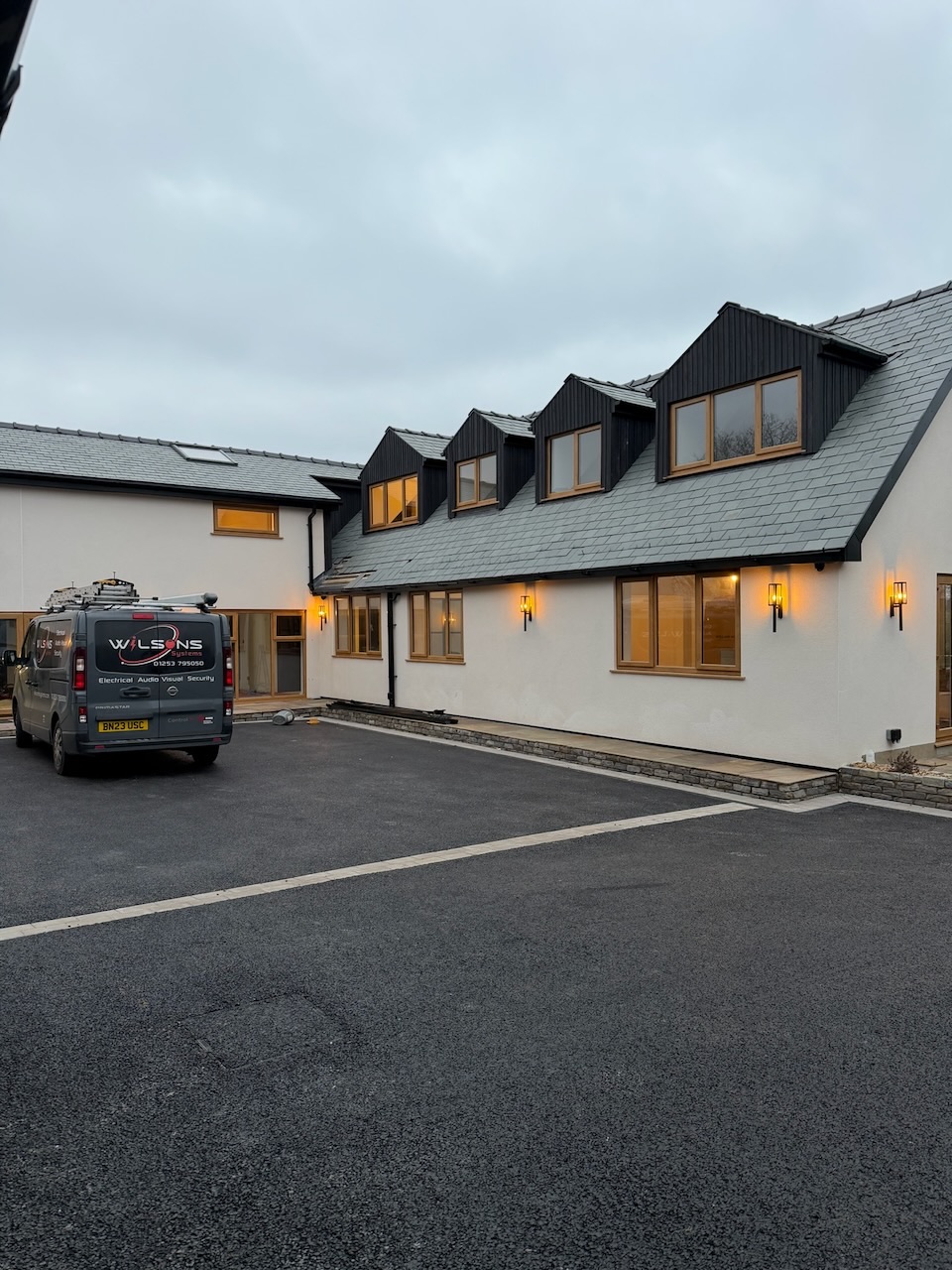 Westby, Lytham — dusk exterior, both properties, automated gate and landscape lighting by Wilsons Systems