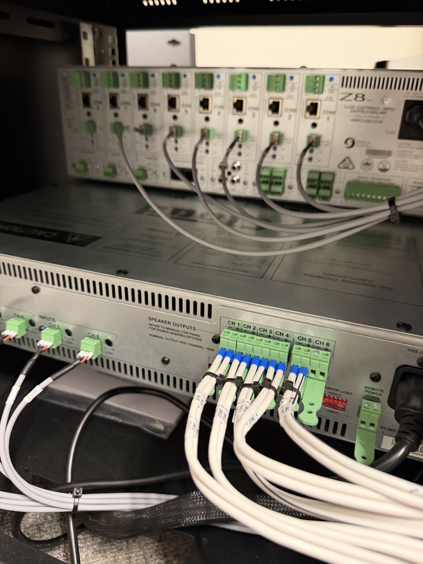 Commercial background music system installed by Wilsons Systems, HTI Group rack-mounted mixer and amplifier